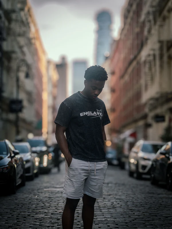 Enclave Elitewear Founder Ethan Wilson poses wearing his custom design T-shirt. (Photo Source: Ethan Wilson)