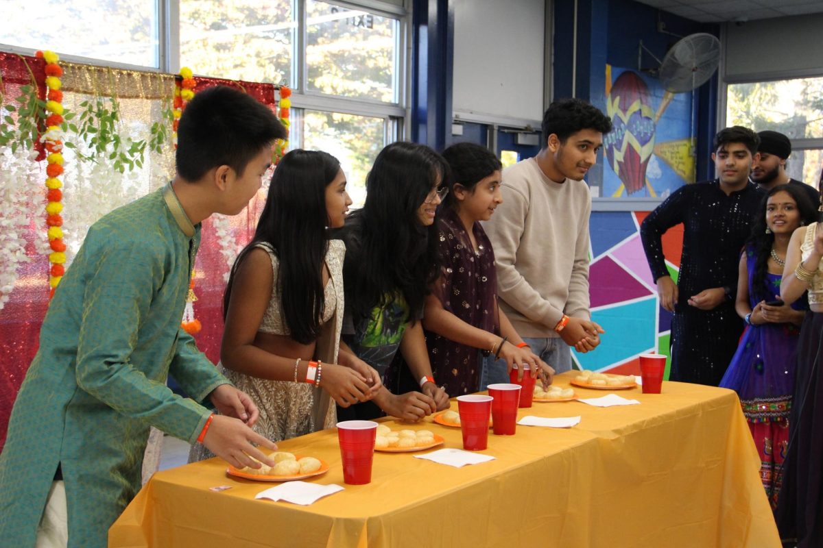 NHP students participate in a panipuri eating competition. 