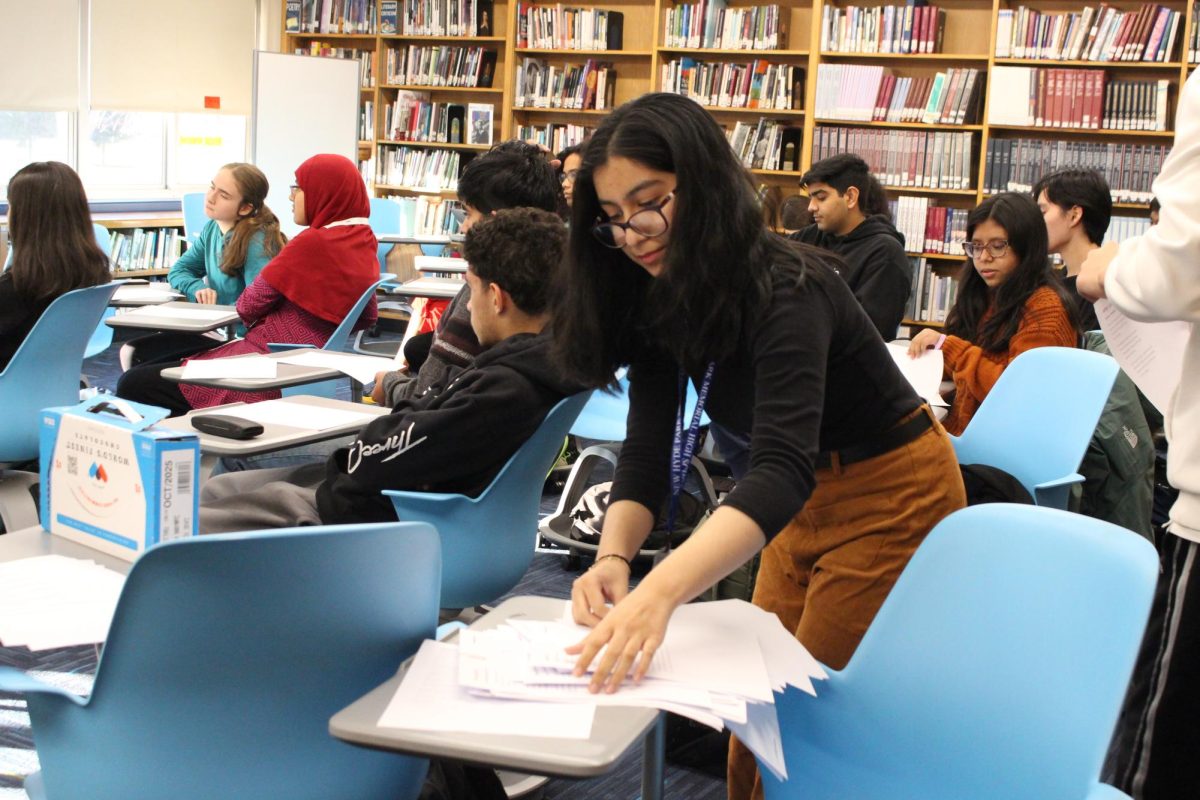 Rifaya Khan prepares her poems to recite at Poetry Out Loud. 