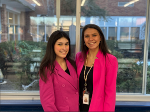 Senior Alyssa Sehn and Ms. Sansotta sport matching pink blazers. (Source by Mr. Otton)