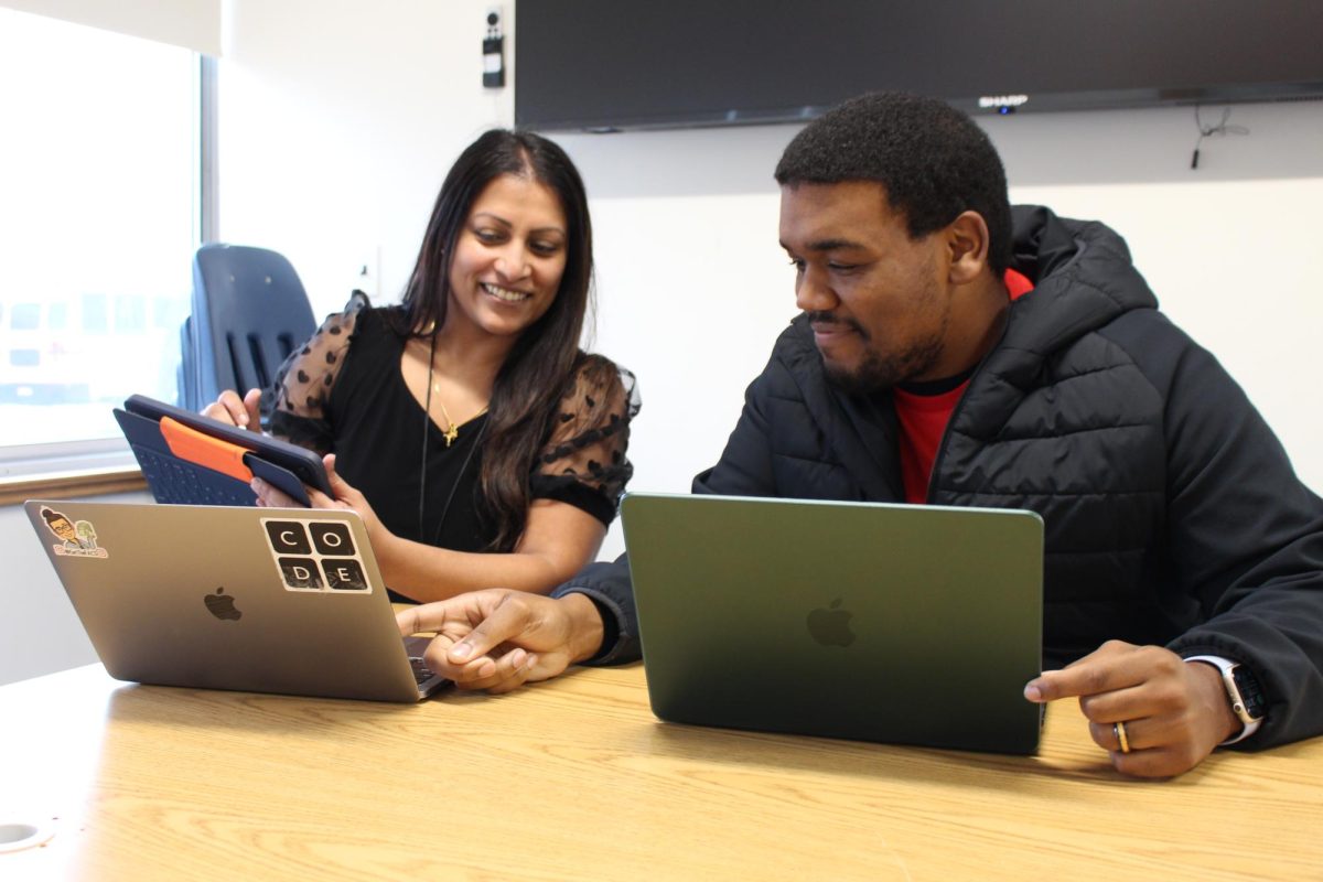 Always ahead of the curve, math teacher Ms. Joseph and business teacher Mr. Claussell makes sure everyone is plugged in and up to speed with the latest technology. 