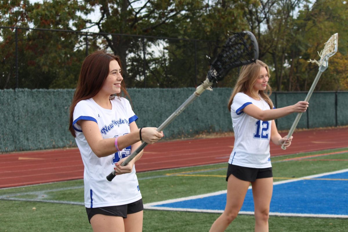 Lacrosse athletes Grace Leonard (left) and Alexa Geigle experienced highs and lows throughout the season, with Leonard receiving a senior scholar athlete distinction.