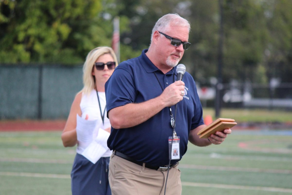 Former principal Dr. Faccio makes a speech at Himecoming. 