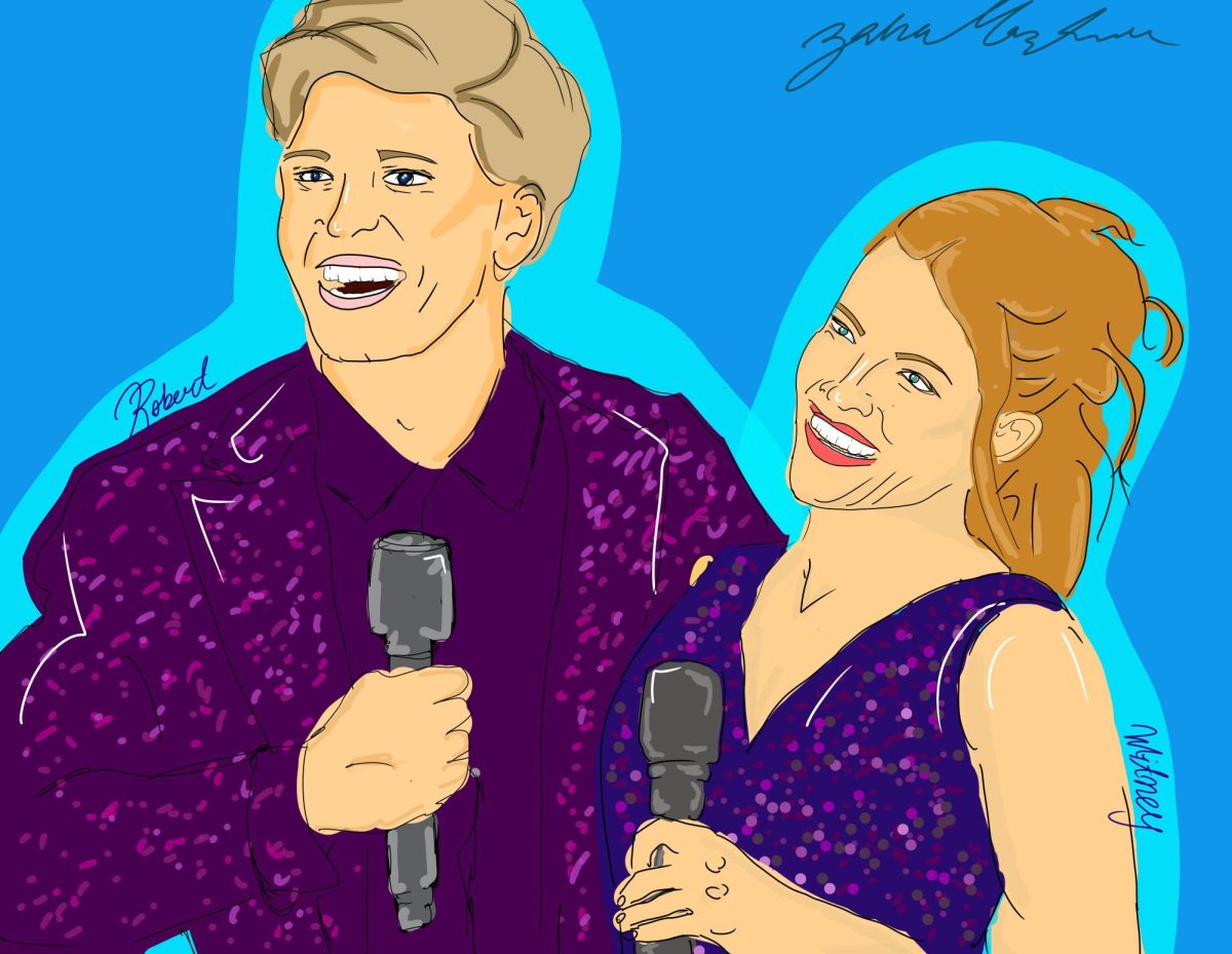 Champions Robert Irwin and Witney Carson stand tall after receiving judge critiques.