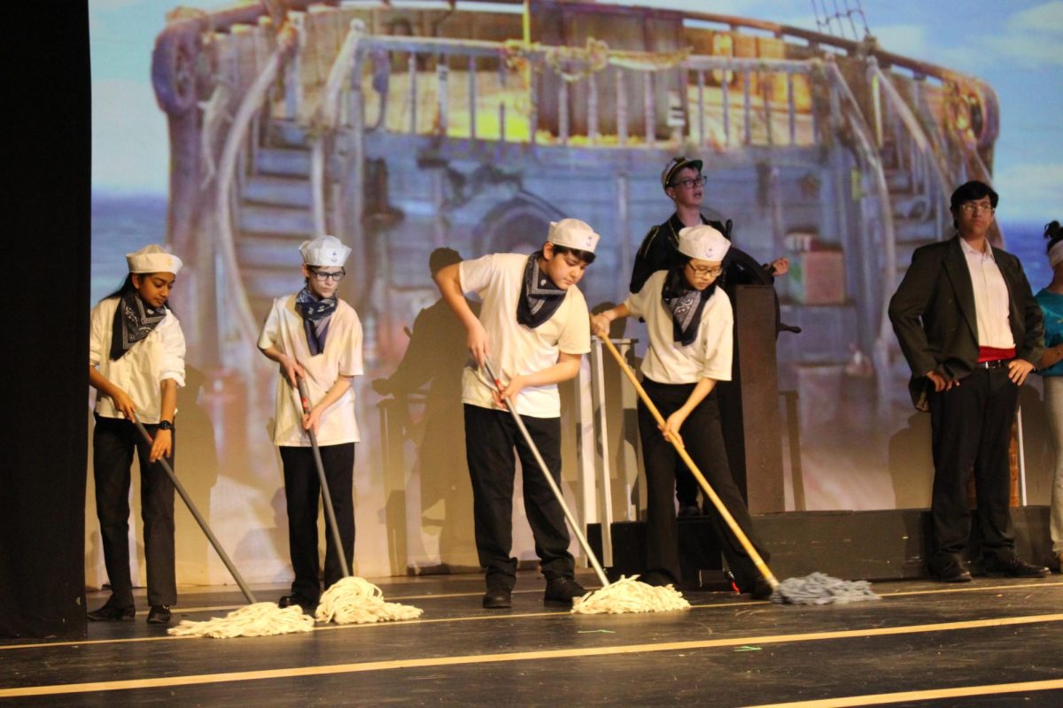 Sailors gather for the opening scene of Prince Eric's introduction. 
