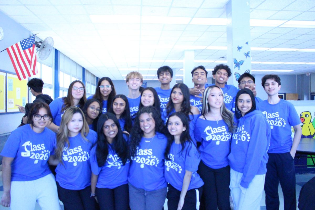 Seniors pose together for a photo.