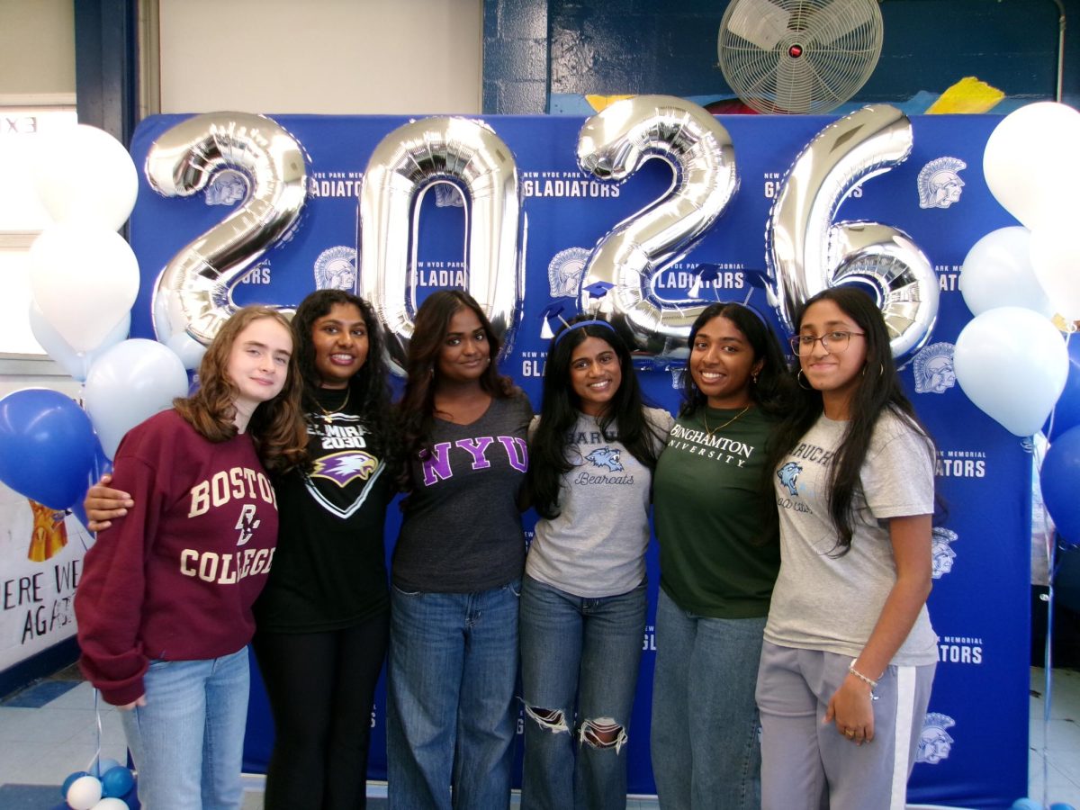 Seniors Carmela Drossman-Schlossberg, Jisha Jinu, Allison Sanassi, Elizabeth George, Sarah Solomon and Rebekah Thomas pose for a picture representing their future colleges. 
(Source by Carmela Drossman-Schlossberg)