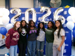 Seniors Carmela Drossman-Schlossberg, Jisha Jinu, Allison Sanassi, Elizabeth George, Sarah Solomon and Rebekah Thomas pose for a picture representing their future colleges. 
(Source by Carmela Drossman-Schlossberg)